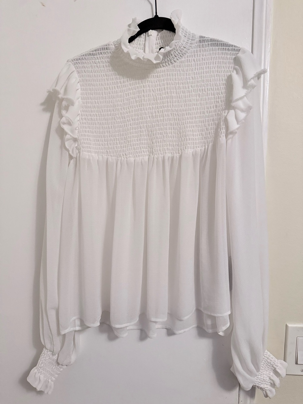The Kooples White Smock Detail Blouse with Flounced Sleeves.